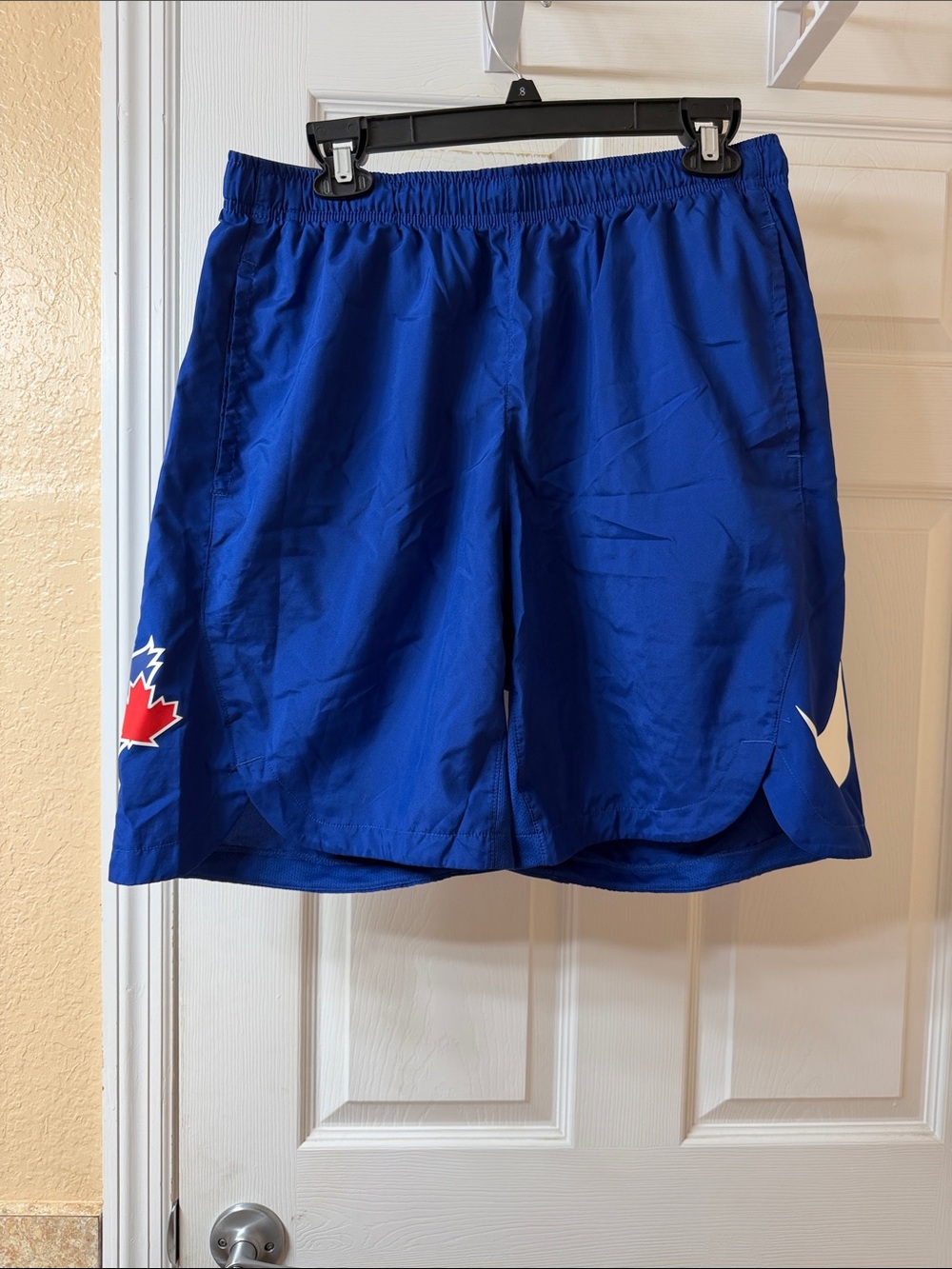 Nike Men’s Royal Blue Athletic Shorts with White Swoosh and Red Maple Accent